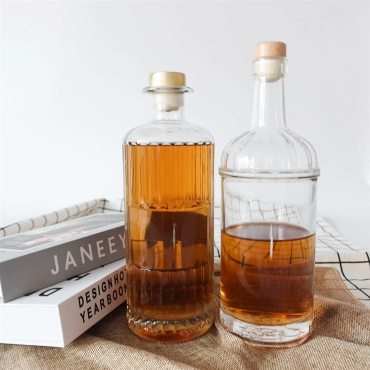 750 ml 730 g apaļa tradicionālā caurspīdīga krama stikla dzēriena degvīna pudele